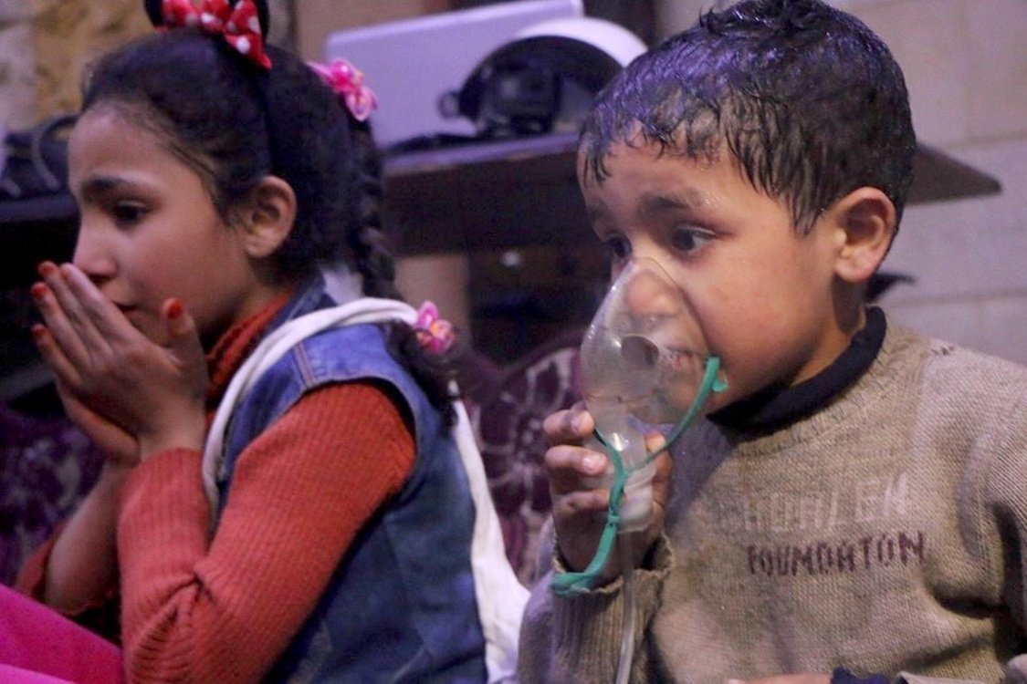 Syrian children receive medical attention after a chemical attack in Eastern Ghouta